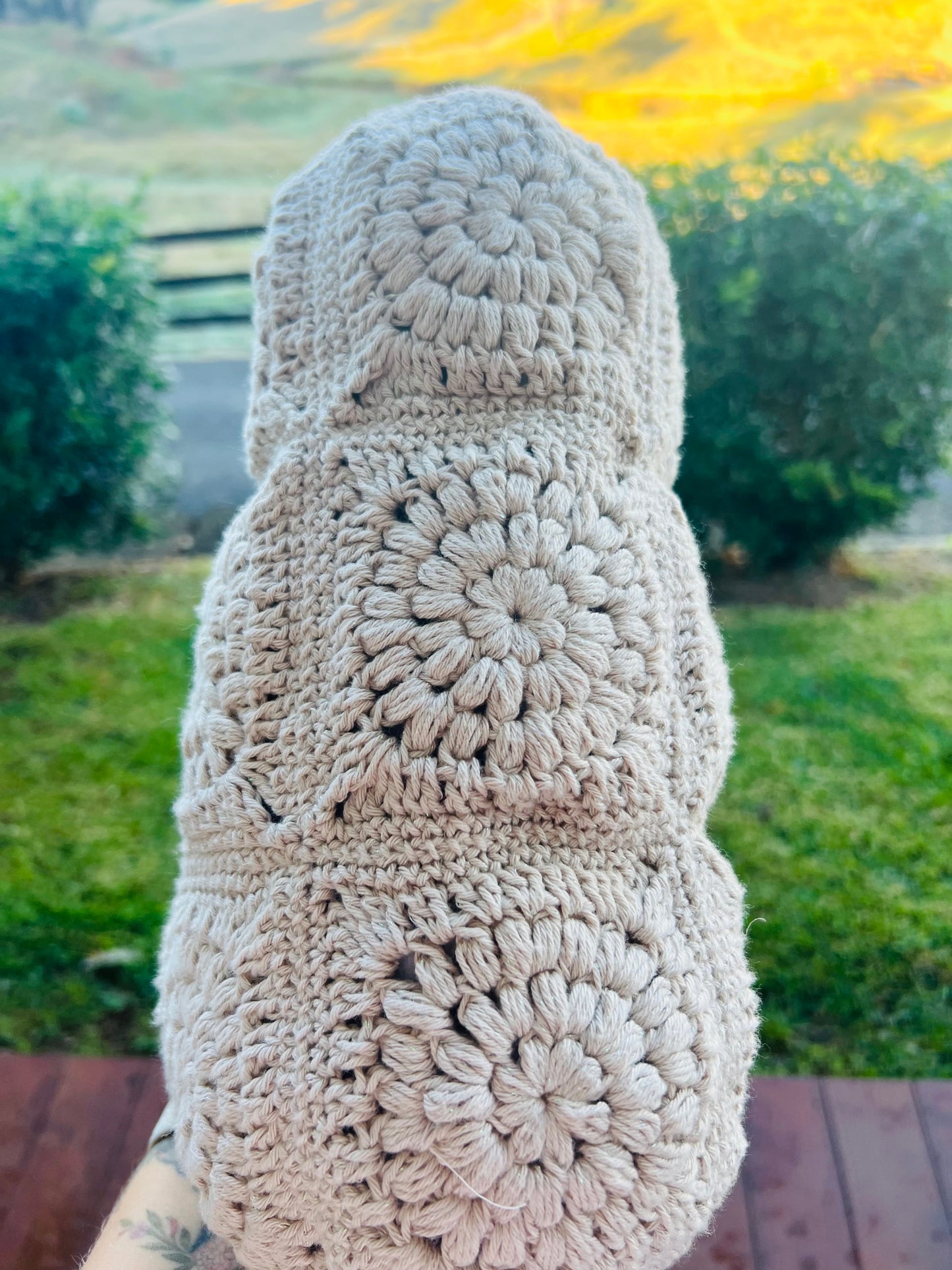 Hand- Crocheted Clutch Bag with Wooden Frame and Amber style kiss lock.